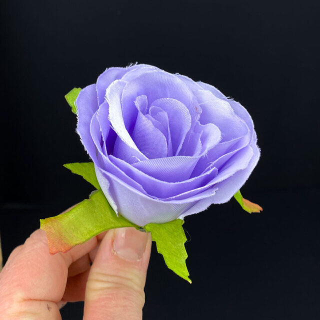 Violetti tekoruusu kukkapää