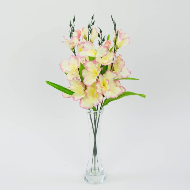 Vaaleankeltainen gladioluksen tekokukka vaaleanpunaisella reunalla
