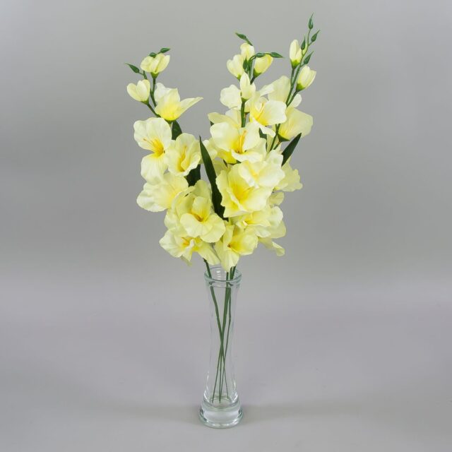 Lämmin kermanvärinen gladioluksen tekokukkaoksa