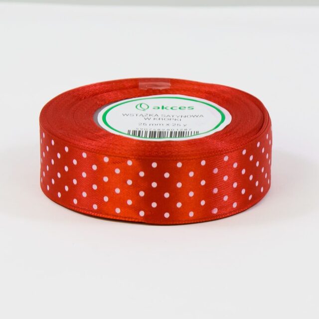 Punainen pilkullinen satiininauha