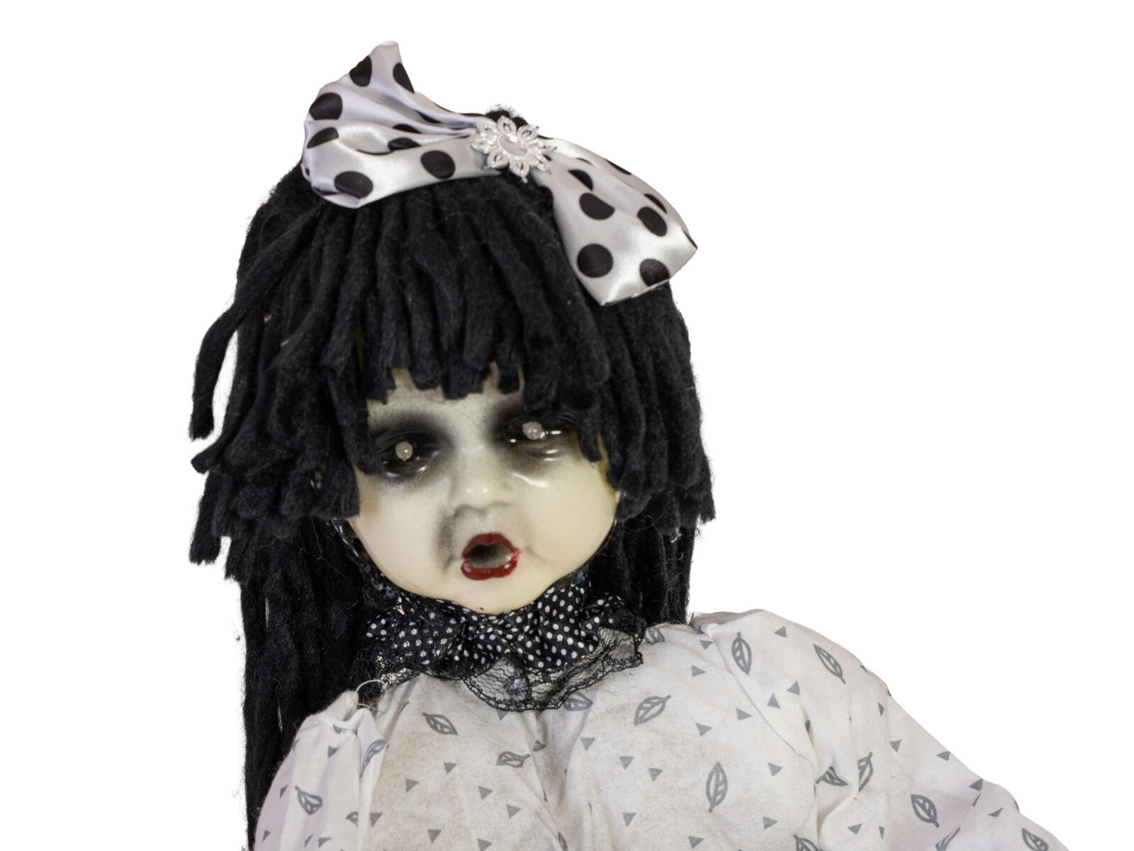 Animoitu Halloween-nukke keinuvassa hevosessa