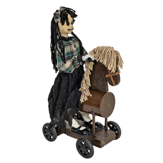 Animoitu Halloween-tyttöhahmo ponin selässä pyörällisellä alustalla